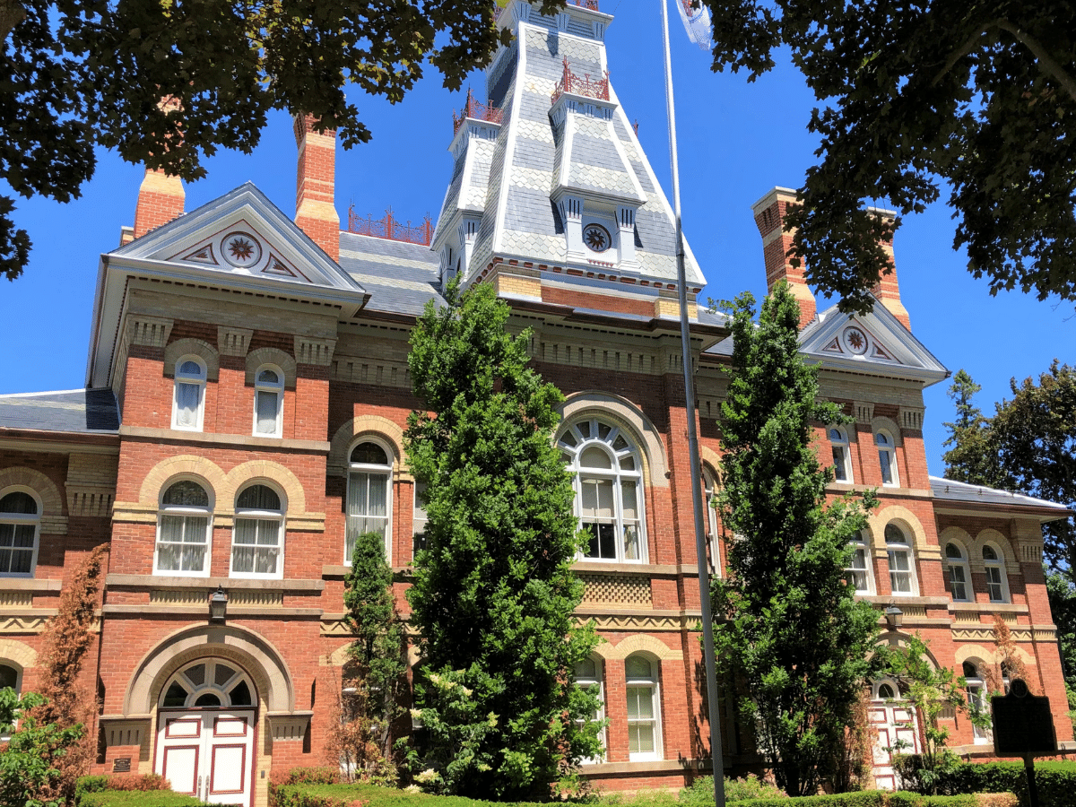 Exterior image of the Dufferin County Courthouse. Photo was taken on a sunny summer day.
